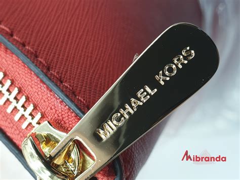 como saber si es michael kors original|michael kors bolso falso.